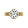 Old mine elongated cushion diamond engagement ring in yellow gold