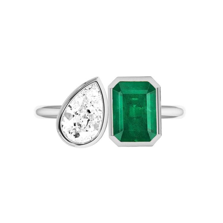 Toi Et Moi Bezel Lab Grown Pear Diamond and Emerald Gemstone Engagement Ring